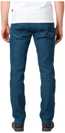 Zadní pohled na Kalhoty Rafiki ROCCA dark blue denim S na modelu, ukazující střih a zadní kapsy. (3)