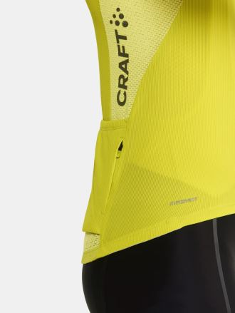 Detail zadní strany Pánského cyklodresu CRAFT ADV Endur žlutá s boční kapsou. (4)