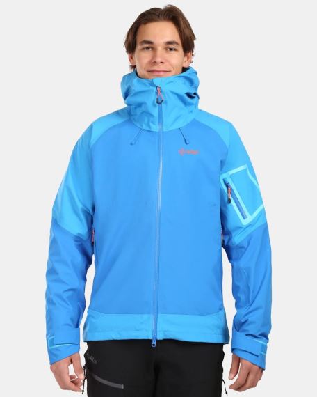 Celkový pohled na Pánská bunda Kilpi ABA- modrá oblečenou na modelu.