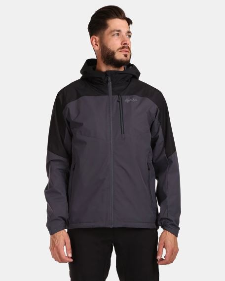 Model prezentuje Pánskou outdoorovou bundu Kilpi OVERA-M tmavě šedou.