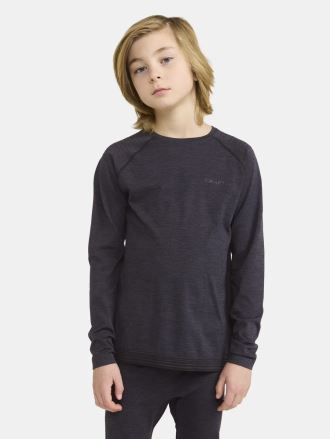Chlapec v černém Dětském funkčním setu Craft CORE Dry Active Comfort. (2)