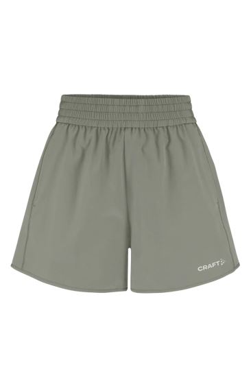 Šortky Craft CORE Essence zelená: přední pohled na dámské sportovní šortky.