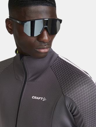 Mužský model v šedé cyklobundě CRAFT ADV ubZ Lume. (5)