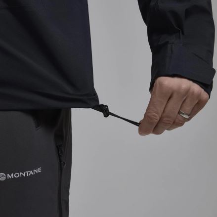 Bunda Montane Torren Jacket black S: detail ruky stahující spodní lem bundy. (7)